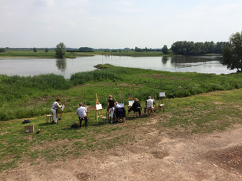 Samen in de natuur achter een ezel schilderen, de Rijn